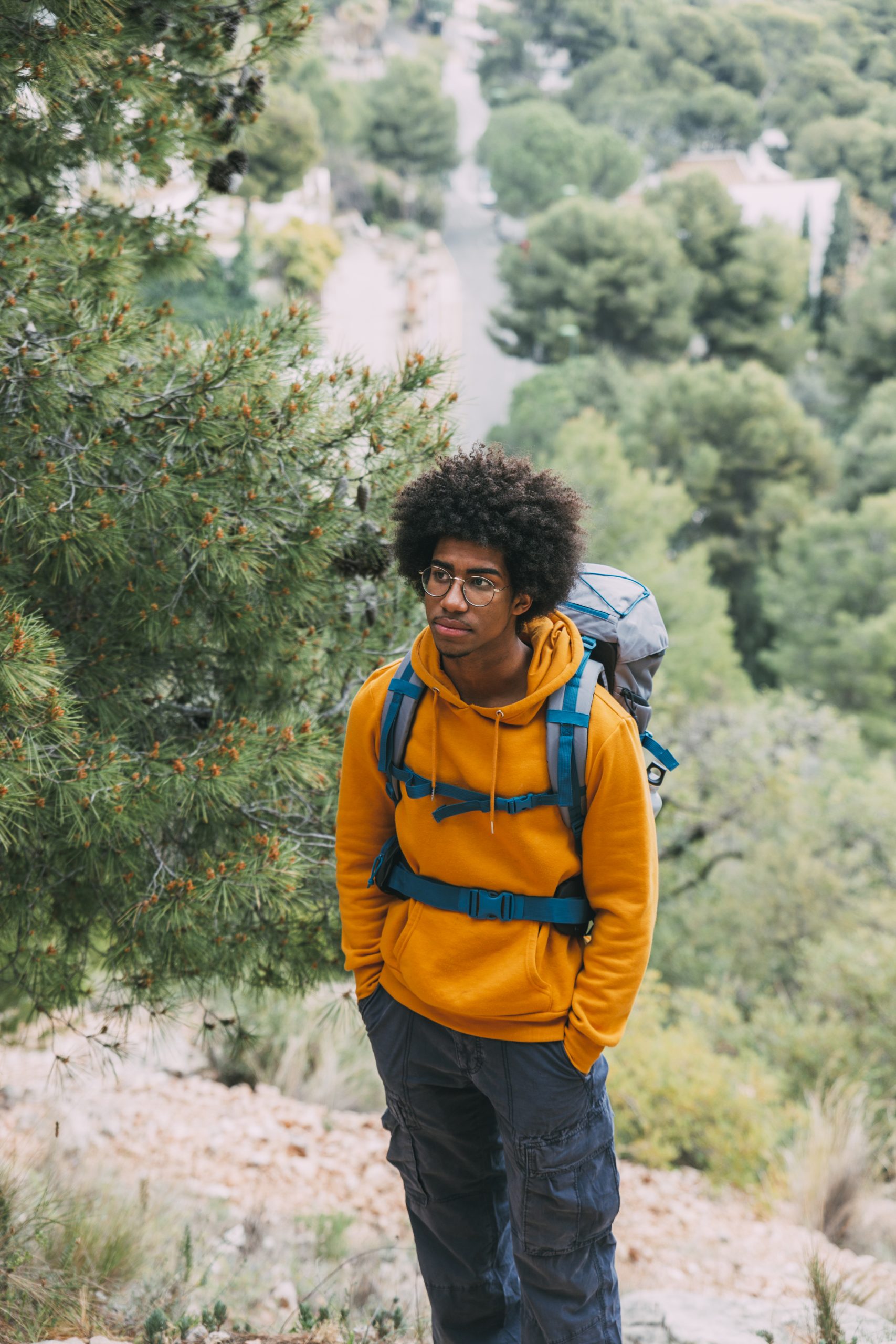 man-trekking-mountains